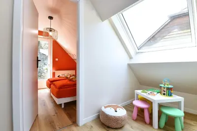 Un ou plusieurs lits dans un hébergement de l'établissement Au Paradis des 4 Saisons - Maison avec terrasse - Baignoire Balneo