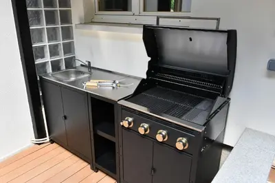 Cuisine ou kitchenette dans l'établissement Au Paradis des 4 Saisons - Maison avec terrasse - Baignoire Balneo