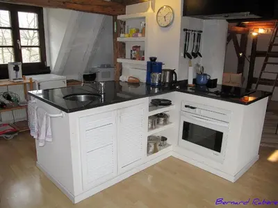 Cuisine ou kitchenette dans l'établissement Plein Sud vue sur les Vosges et le vignoble