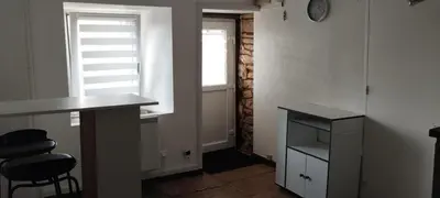 Cuisine ou kitchenette dans l'établissement Appartement F2