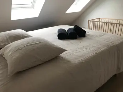 Un ou plusieurs lits dans un hébergement de l'établissement Duplex LOUIS