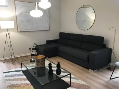 Coin salon dans l'établissement Duplex LOUIS