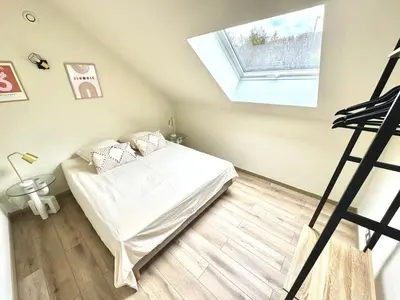 Un ou plusieurs lits dans un hébergement de l'établissement Gîte ARTHUR