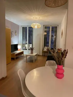 Coin salon dans l'établissement Mulhouse hyper centre - Grand T3- Aux bons enfants