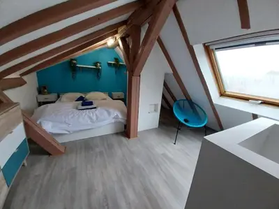 Un ou plusieurs lits dans un hébergement de l'établissement Sous les toits-Hypercentre-Pas de Frais de Ménage
