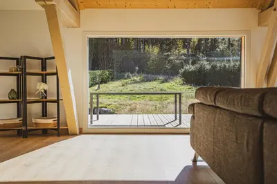 Un ou plusieurs lits dans un hébergement de l'établissement La Flânerie, spacieux loft au calme avec jacuzzi
