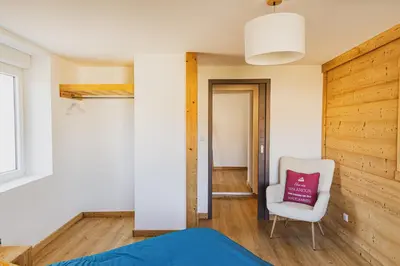 Un ou plusieurs lits dans un hébergement de l'établissement Les Confiseries, appartement 2 pièces et terrasse