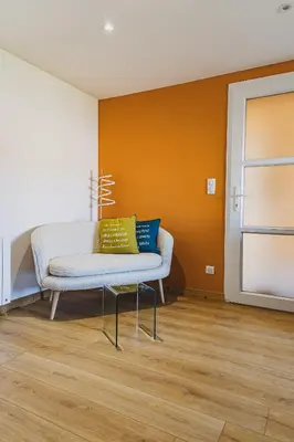 Coin salon dans l'établissement Les Confiseries, appartement 2 pièces et terrasse
