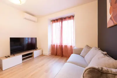 Télévision ou salle de divertissement dans l'établissement Le Confort de l'Ours