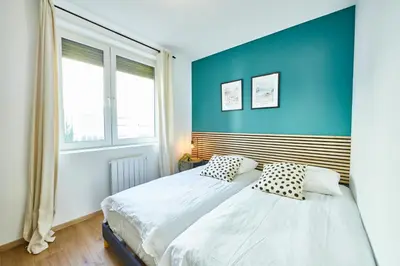 Un ou plusieurs lits dans un hébergement de l'établissement BE-2D Joli 3 pièces tout équipé pour 1-4 pers 2ème étage au centre de Mulhouse