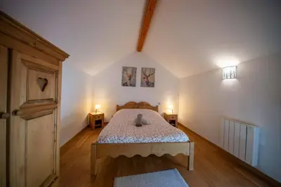 Un ou plusieurs lits dans un hébergement de l'établissement Le chalet Montanea-Jacuzzi-Free parking