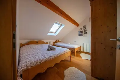 Un ou plusieurs lits dans un hébergement de l'établissement Le chalet Montanea-Jacuzzi-Free parking