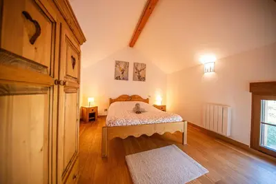 Un ou plusieurs lits dans un hébergement de l'établissement Le chalet Montanea-Jacuzzi-Free parking