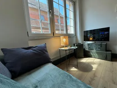 Coin salon dans l'établissement L'arbalète - Centre ville - 2 personnes