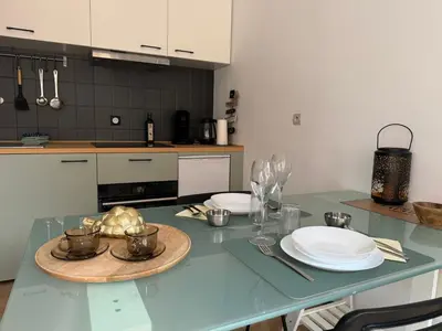 Cuisine ou kitchenette dans l'établissement L'arbalète - Centre ville - 2 personnes