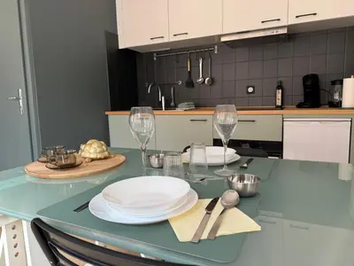 Cuisine ou kitchenette dans l'établissement L'arbalète - Centre ville - 2 personnes