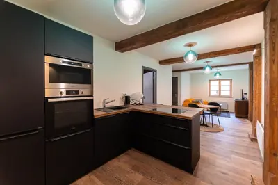 Cuisine ou kitchenette dans l'établissement Zellenberg - Les Amandiers - Spa & Sauna