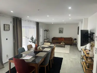 Coin salon dans l'établissement Appartement plain-pied en Alsace