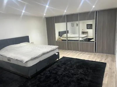 Un ou plusieurs lits dans un hébergement de l'établissement Appartement plain-pied en Alsace