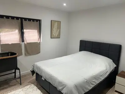 Un ou plusieurs lits dans un hébergement de l'établissement Appartement plain-pied en Alsace