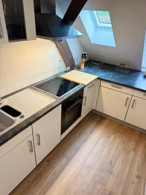 Cuisine ou kitchenette dans l'établissement Le Cocon de l'Arc, parking free