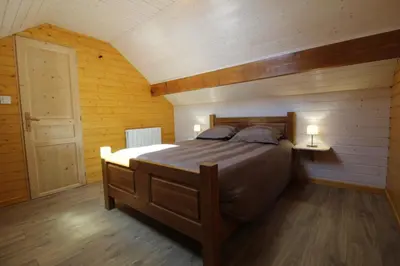 Un ou plusieurs lits dans un hébergement de l'établissement Gîte à rufus