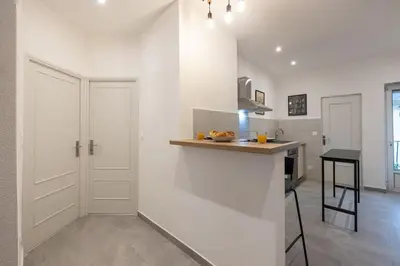 Cuisine ou kitchenette dans l'établissement MonSéjourCosy - L'Escapade - Spacieux - Netflix