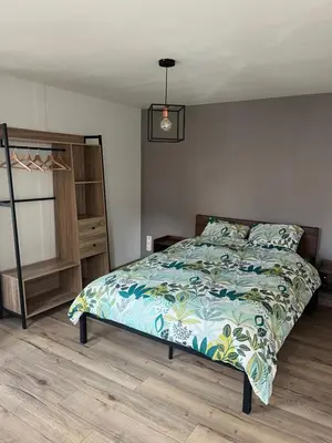 Un ou plusieurs lits dans un hébergement de l'établissement Charmant appartement au cœur de Buhl