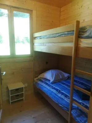 Un ou plusieurs lits dans un hébergement de l'établissement Chalet près de Gérardmer zone Natura 2000