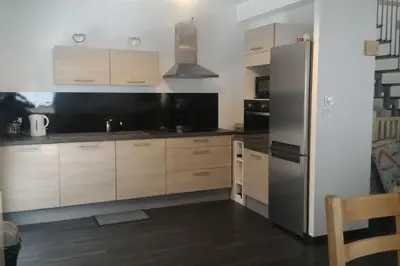 Cuisine ou kitchenette dans l'établissement Chalet Au Cottage des Lynx