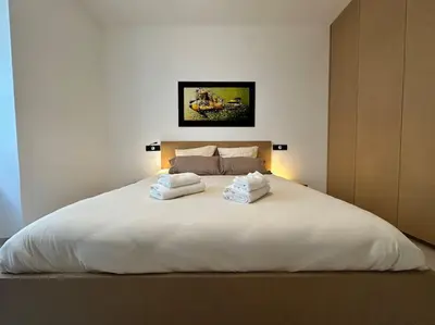 Un ou plusieurs lits dans un hébergement de l'établissement Le Big Stork - Appartement - Centre Historique