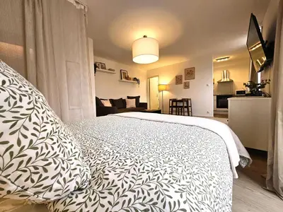 Un ou plusieurs lits dans un hébergement de l'établissement Studio Cosy- Hyper Centre Ville
