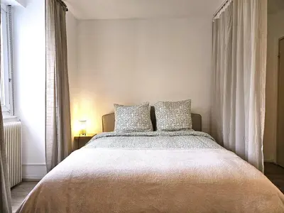 Un ou plusieurs lits dans un hébergement de l'établissement Studio Cosy- Hyper Centre Ville