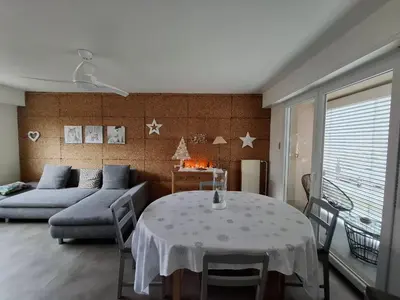 Coin salon dans l'établissement Charmante maison familiale