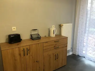 Cuisine ou kitchenette dans l'établissement Appartement Les Sorbiers