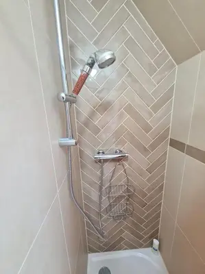 Salle de bains dans l'établissement la cigogne d'Alsace 1