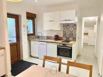 Cuisine ou kitchenette dans l'établissement Le Beuty