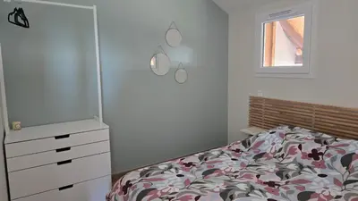 Un ou plusieurs lits dans un hébergement de l'établissement Appartement moderne et cosy