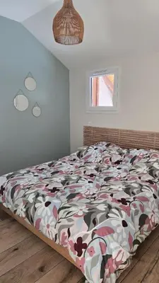 Un ou plusieurs lits dans un hébergement de l'établissement Appartement moderne et cosy