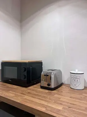 Cuisine ou kitchenette dans l'établissement Studio Charme Huningue Abbatucci