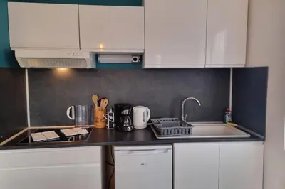 Cuisine ou kitchenette dans l'établissement Le petit Géromois - Free parking