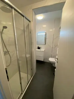Salle de bains dans l'établissement Nouveau-L'Alsakrat-au coeur de Munster