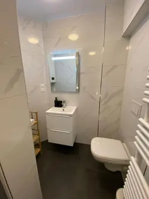 Salle de bains dans l'établissement Nouveau-L'Alsakrat-au coeur de Munster