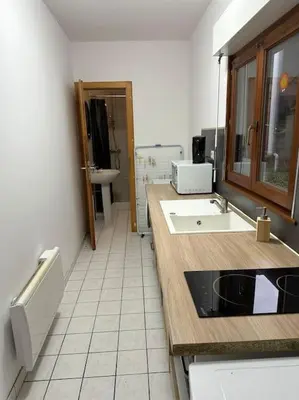 Cuisine ou kitchenette dans l'établissement Lure centre