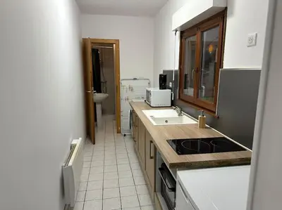 Cuisine ou kitchenette dans l'établissement Lure centre