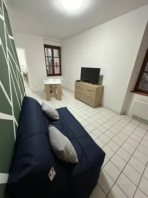 Télévision ou salle de divertissement dans l'établissement Lure centre