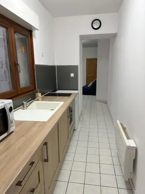 Cuisine ou kitchenette dans l'établissement Lure centre