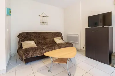 Télévision ou salle de divertissement dans l'établissement Le Printemps - Appt vue montagne avec terrasse