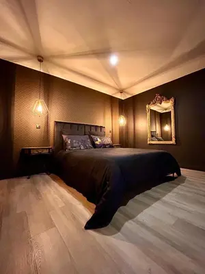 Un ou plusieurs lits dans un hébergement de l'établissement Suite Josefina - SPA&SAUNA - au cœur de la route des vins