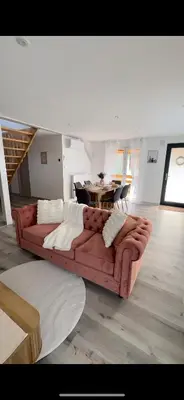 Coin salon dans l'établissement Gîte duplex les Glycines
